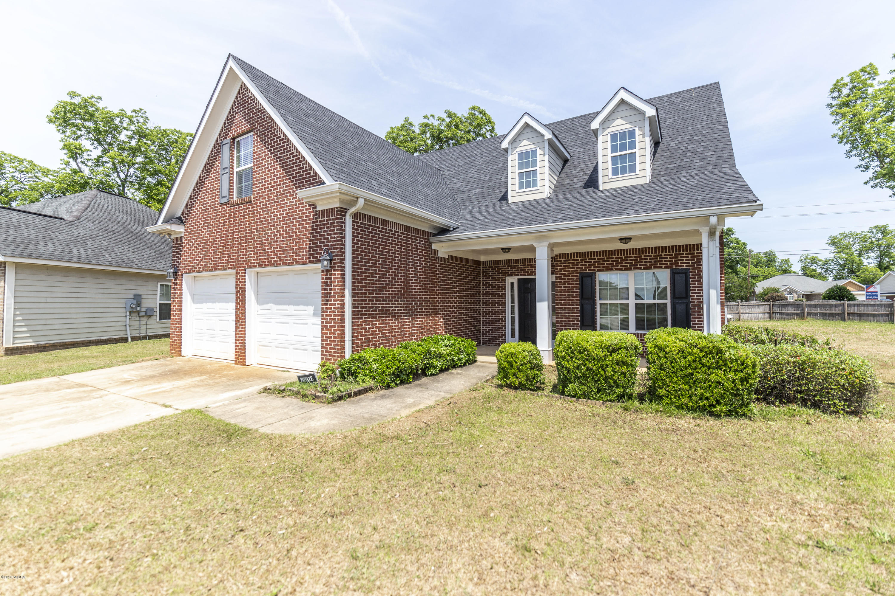 415 Bob White Road Macon, GA 31216 - Photo 4 of 43 a front view of a house with garden