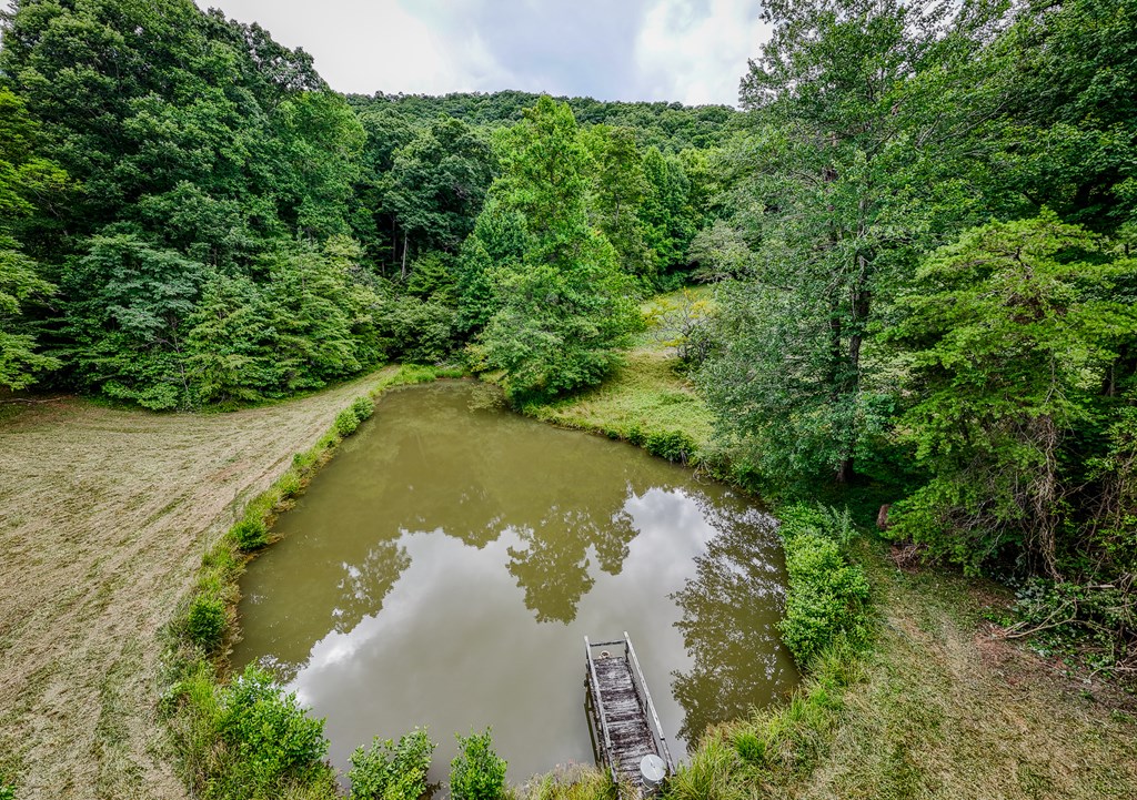 0 Crowe Road Murphy, NC 28906 - Photo 43 of 51 an aerial view of a house with a yard and lake view