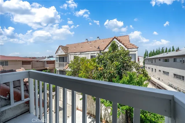a view of a balcony with an outdoor space