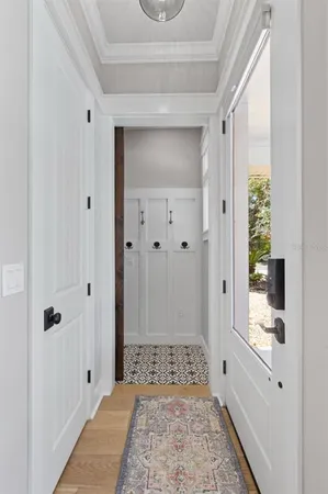 a white bath tub sitting next to a white toilet