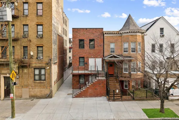a front view of a building with glass windows