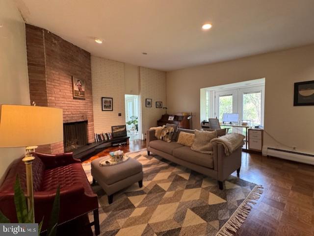 6 Branchwood Court Baltimore, MD 21208 - Photo 13 of 29 a living room with furniture a fireplace and a flat screen tv