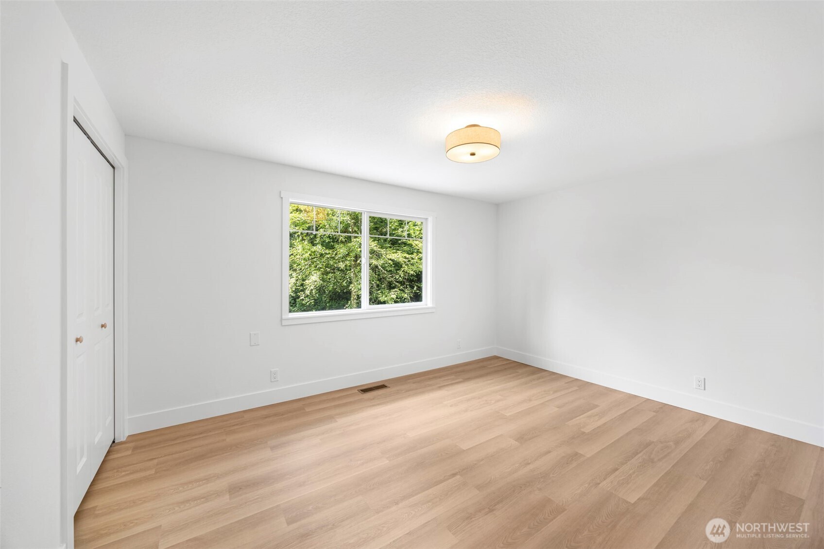 121 West Winesap Road Bothell, WA 98012 - Photo 19 of 29 an empty room with windows