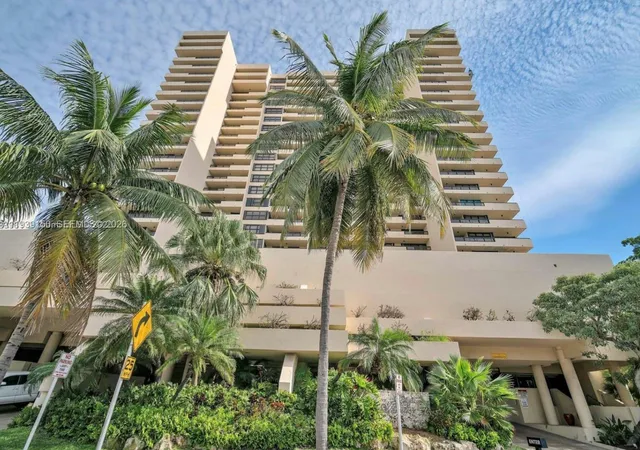 a view of a palm tree with a palm tree