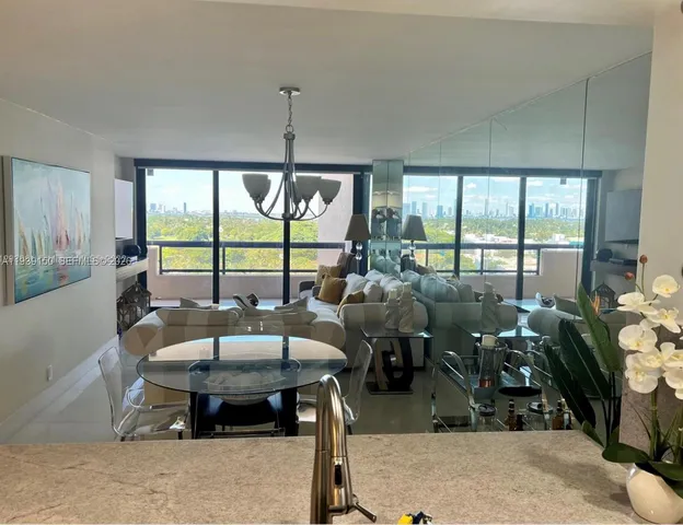 a very nice looking dining room with a table and chairs