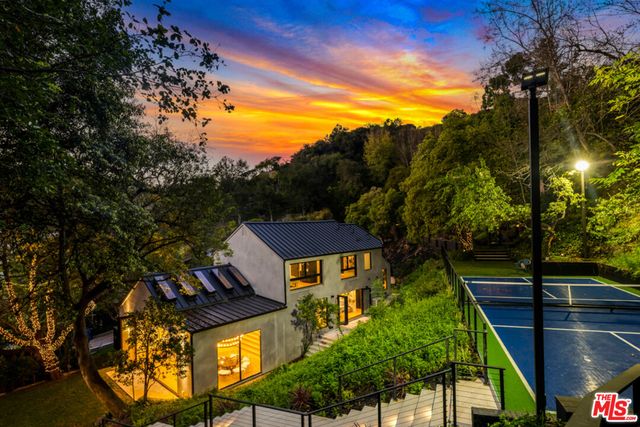 a view of a house with a large window