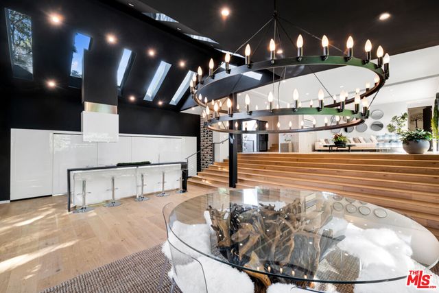 a view of a balcony with wooden floor