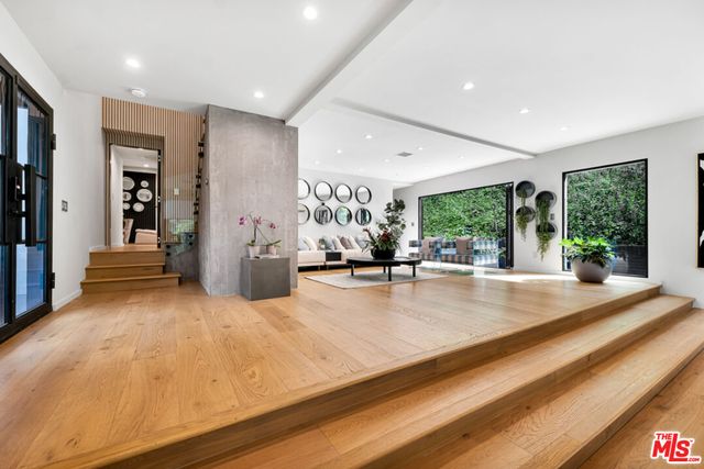 a bathroom with 2 sink and a mirror