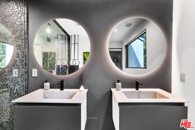 a view of a backyard with chairs