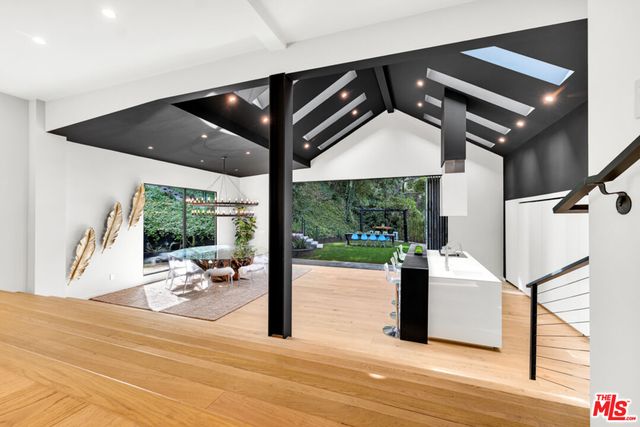 a table with a vase and flowers on it