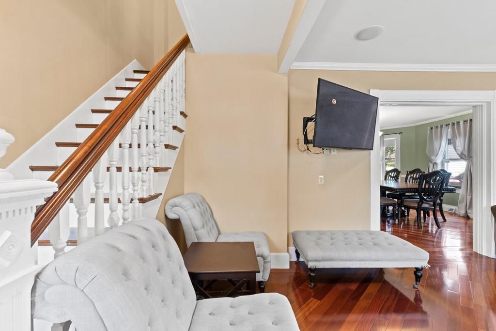 143 18th Street Lowell, MA 01850 - Photo 15 of 35 a living room with furniture and a table