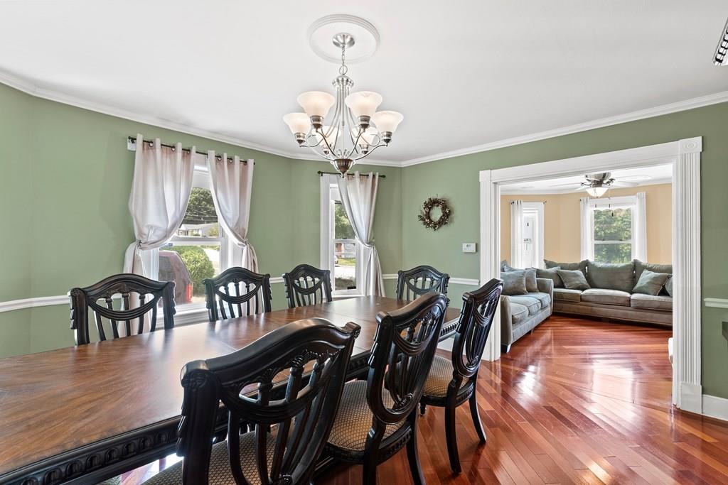 143 18th Street Lowell, MA 01850 - Photo 17 of 35 a view of a dining room with furniture window and wooden floor