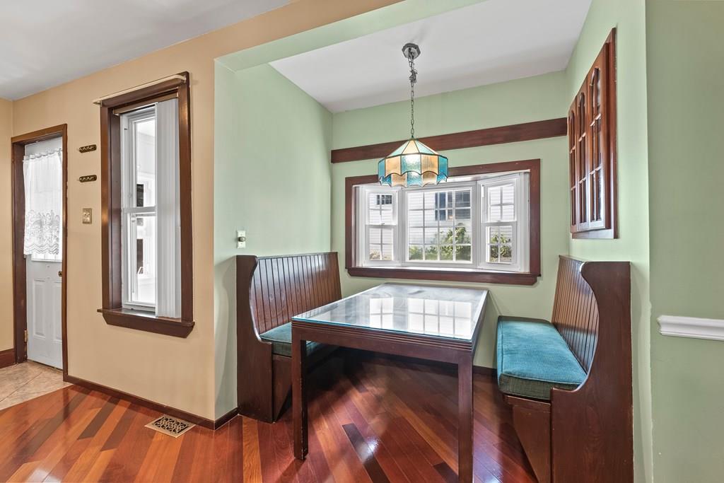 143 18th Street Lowell, MA 01850 - Photo 22 of 35 a living room with furniture and a window