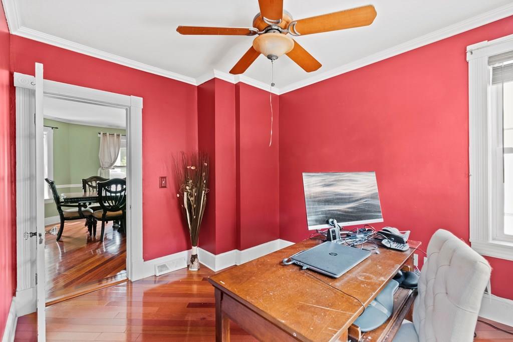 143 18th Street Lowell, MA 01850 - Photo 23 of 35 a room with furniture and a window