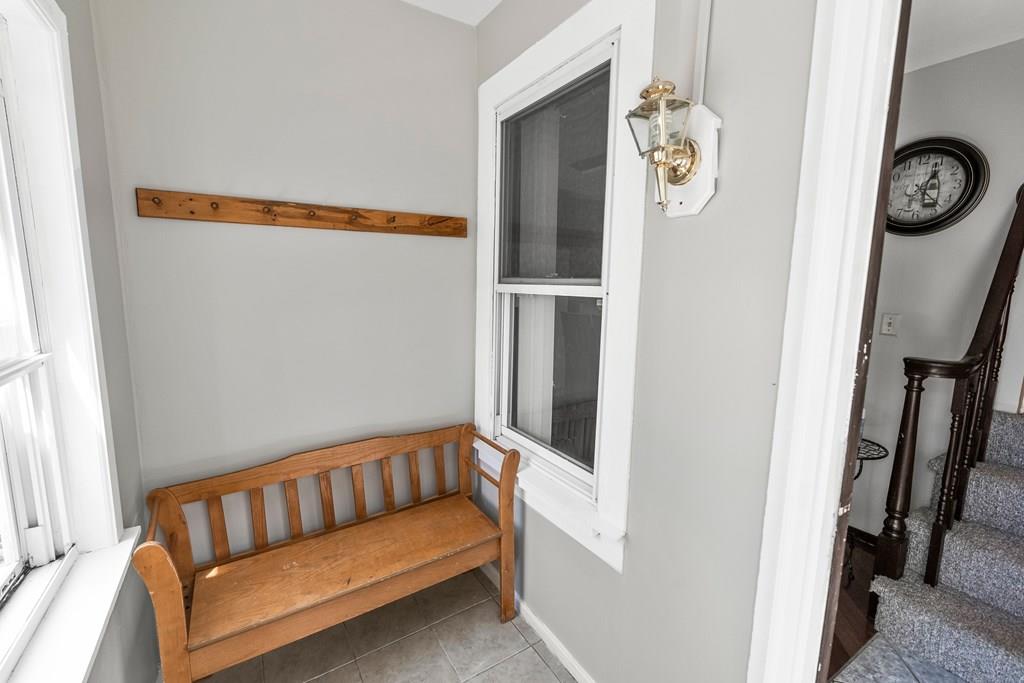 143 18th Street Lowell, MA 01850 - Photo 34 of 35 a view of entryway with stairs and a hallway