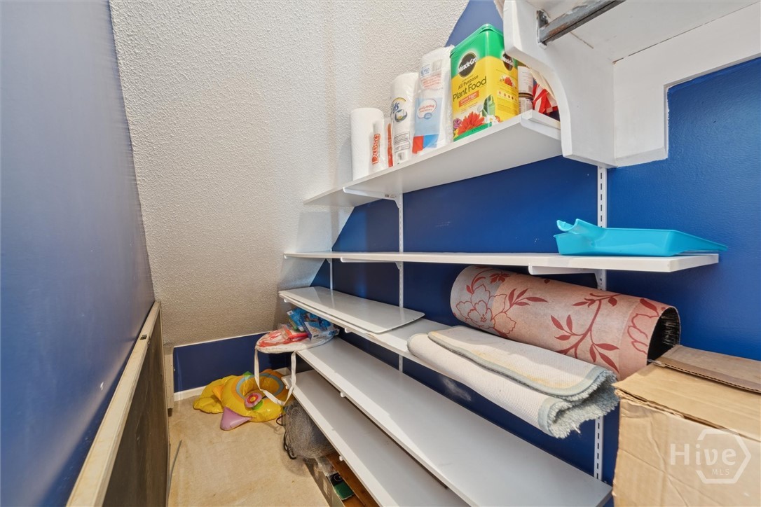 12502 Apache Avenue, Unit 38 Savannah, GA 31419 - Photo 16 of 45 This area under the stairs provides lots of storage room for a small freezer, wine fridge, fishing gear, pool toys, and any extras.