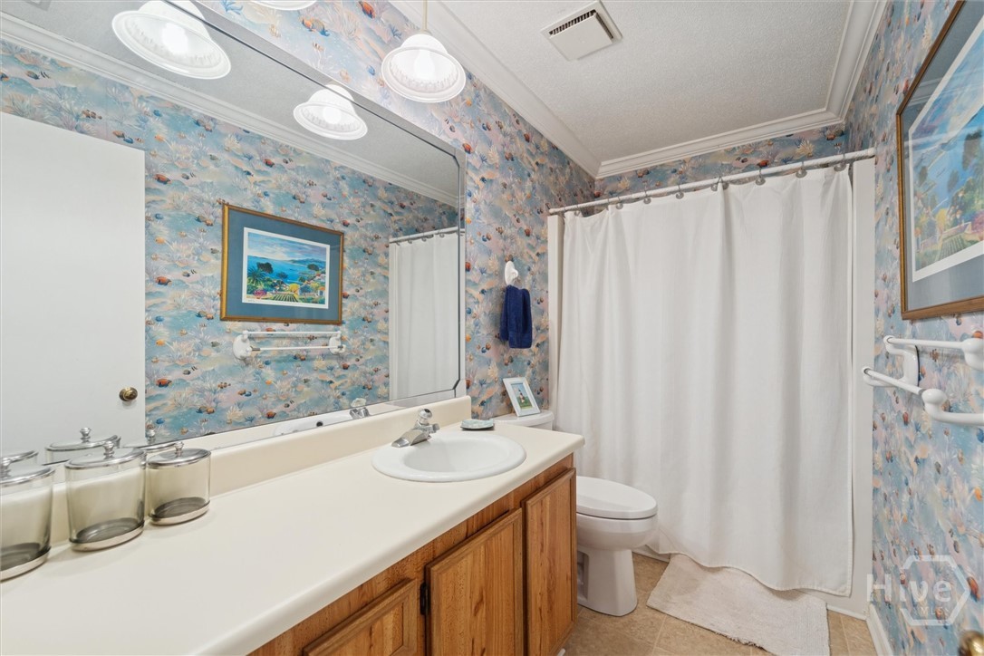 12502 Apache Avenue, Unit 38 Savannah, GA 31419 - Photo 26 of 45 A full second bath upstairs serves the guest room.