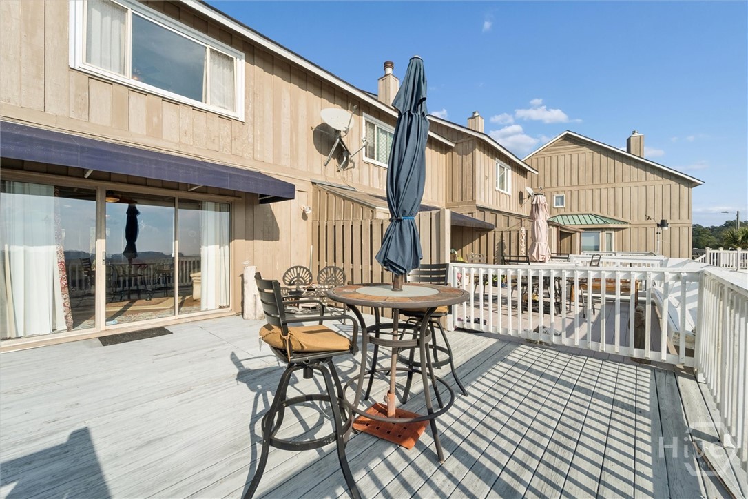 12502 Apache Avenue, Unit 38 Savannah, GA 31419 - Photo 32 of 45 The large deck is just outside the downstairs living area. It overlooks the water and community dock.