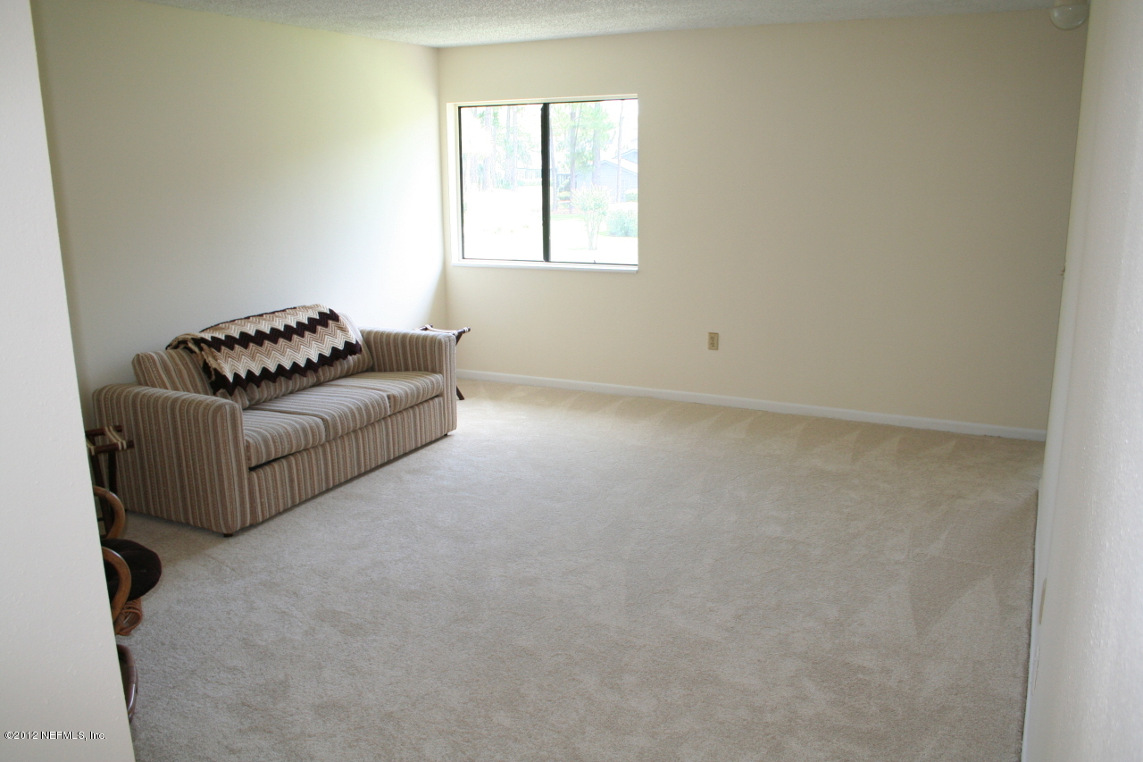 8 Cove Road Ponte Vedra Beach, FL 32082 - Photo 15 of 19 upstairs family sitting room