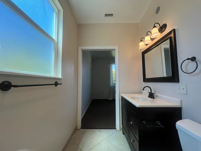 a view of an entryway with a chandelier