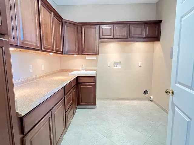 a view of front door of house with a front door