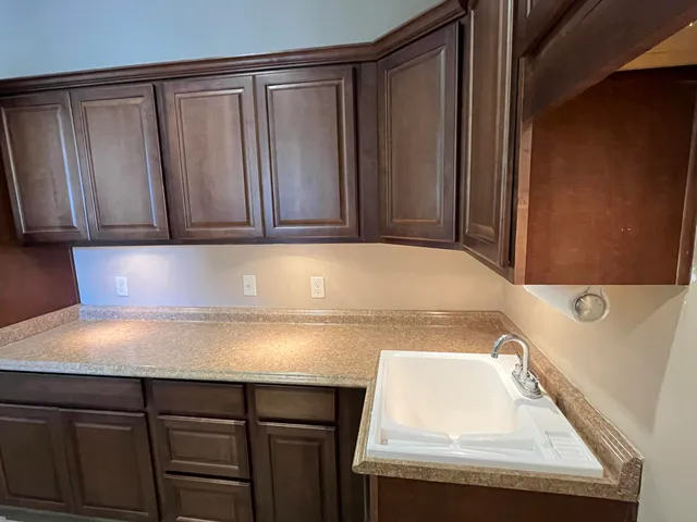 a view of an empty room with a balcony