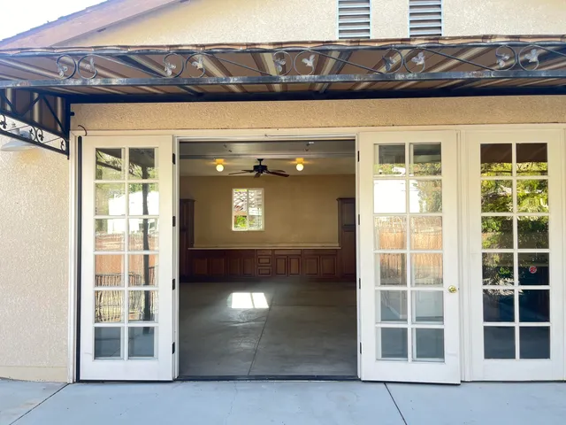 a view of hallway with windows