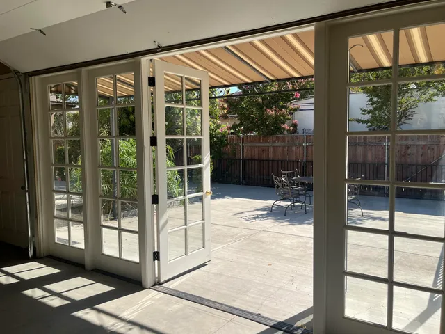 a view of a porch with seating space