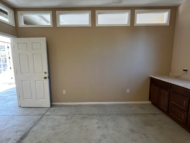 a bathroom with a sink and mirror