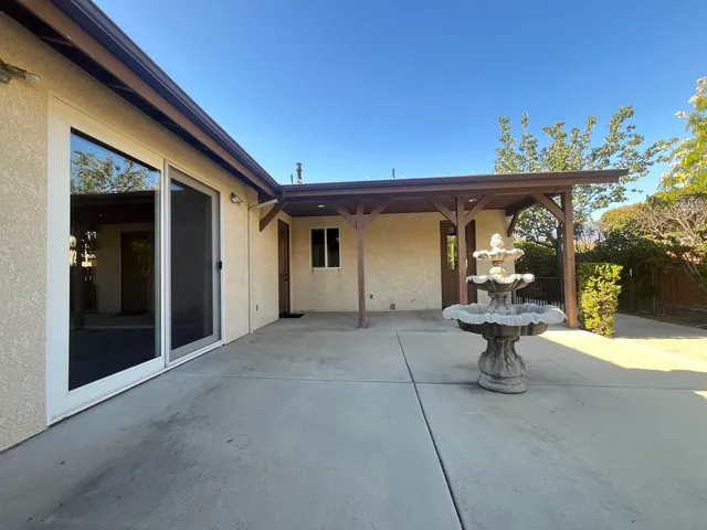 a view of a house with a roof deck