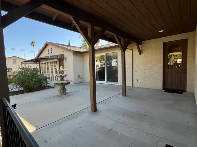 a front view of a house with a glass door