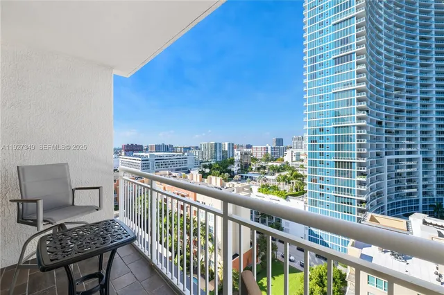a view of balcony with furniture