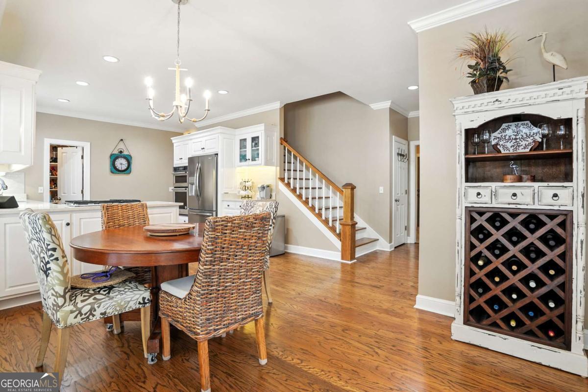 202 Vassar Point Drive St. Simons, GA 31522 - Photo 13 of 62 a view of a livingroom with furniture and wooden floor