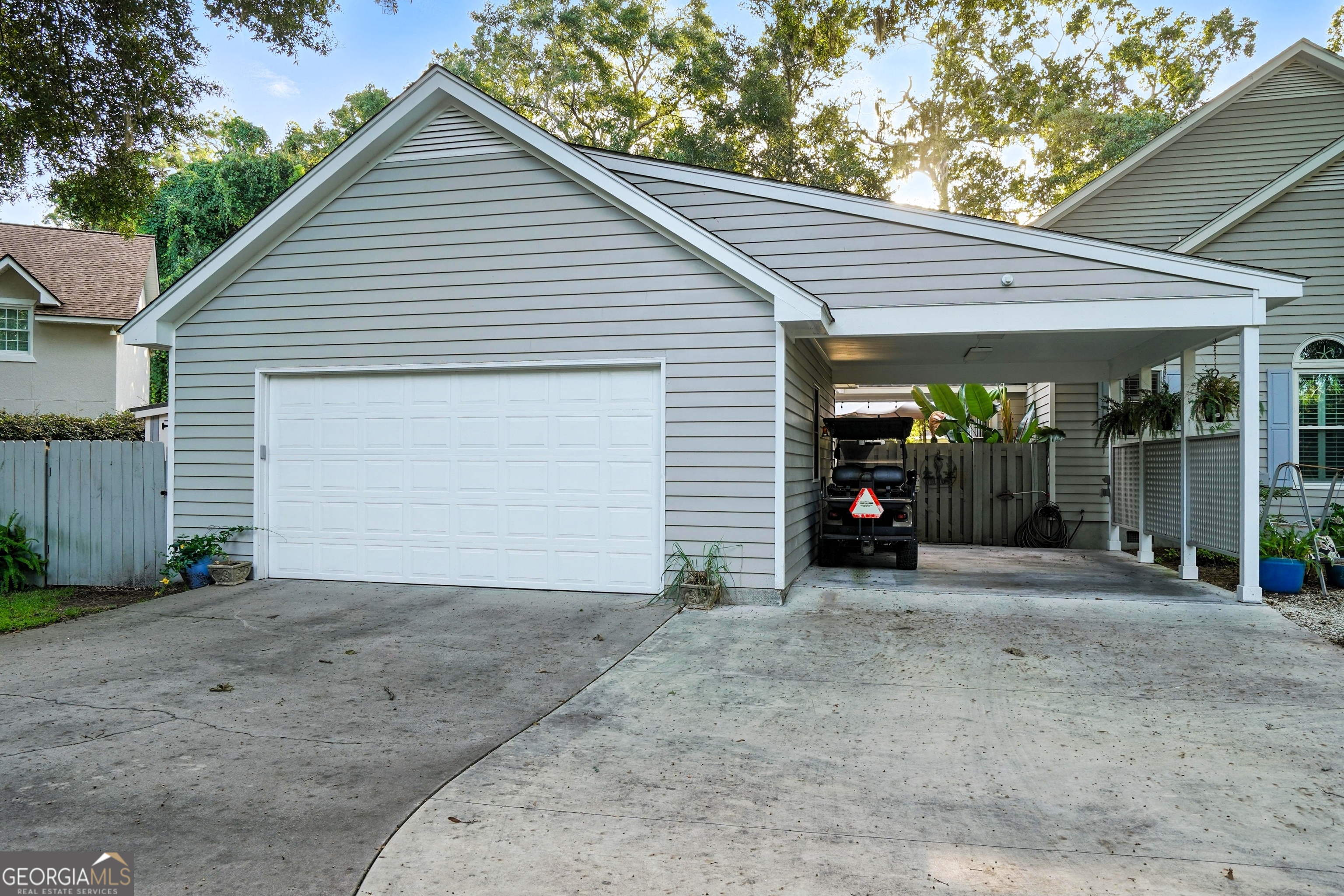202 Vassar Point Drive St. Simons, GA 31522 - Photo 60 of 62 a view of a house with a outdoor space