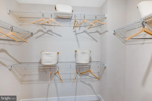 a view of a room with racks on the wall