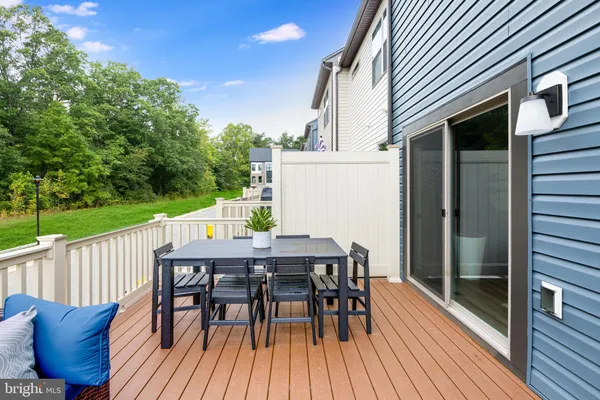 a view of a deck patio and outdoor seating