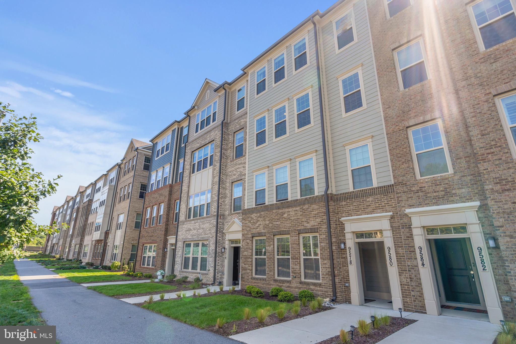 a view of a building with a yard