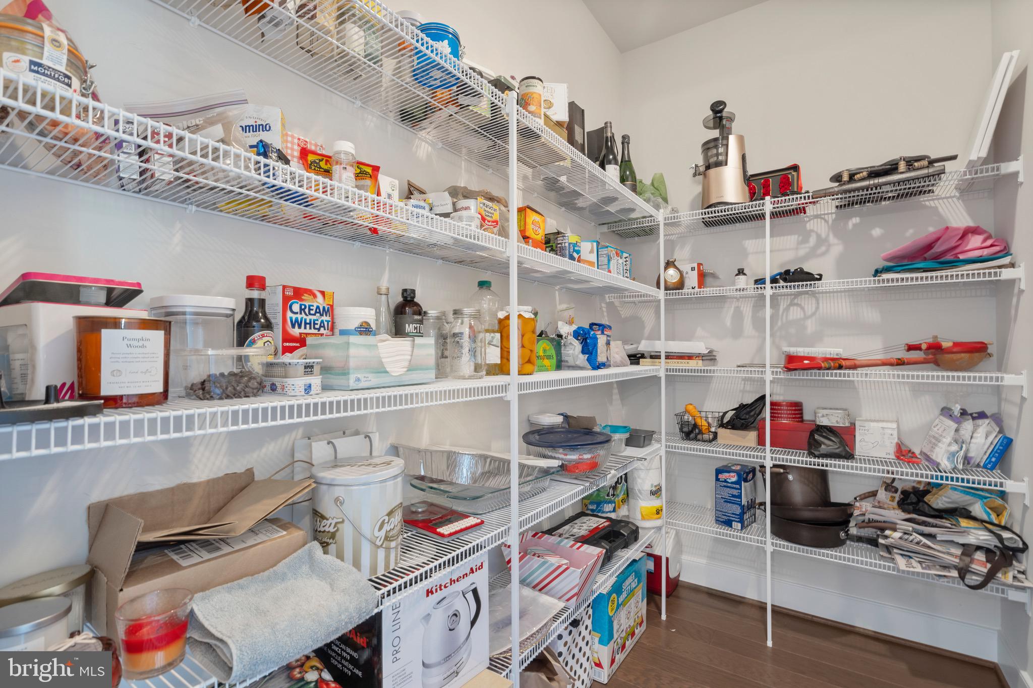 9580 Fields Road Gaithersburg, MD 20878 - Photo 15 of 58 a utility room with stainless steel appliances a sink and hanging wooden floor