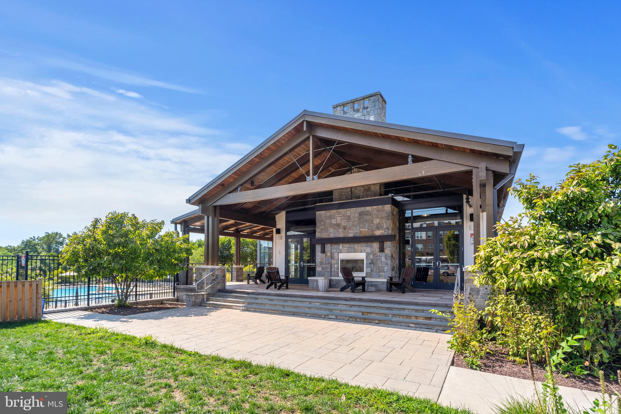 9580 Fields Road Gaithersburg, MD 20878 - Photo 45 of 58 a view of a chair and table of the house