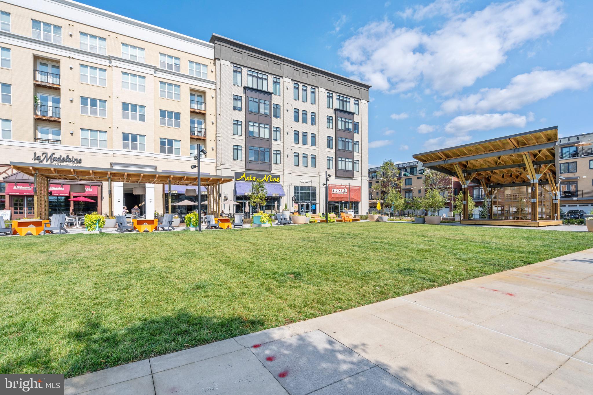 9580 Fields Road Gaithersburg, MD 20878 - Photo 51 of 58 front view of a building with a yard