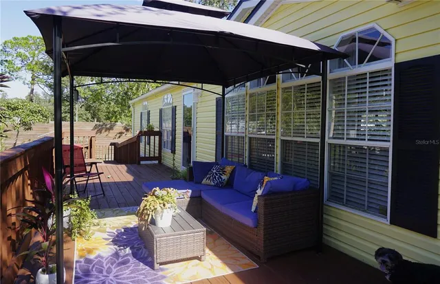 a view of porch with seating space