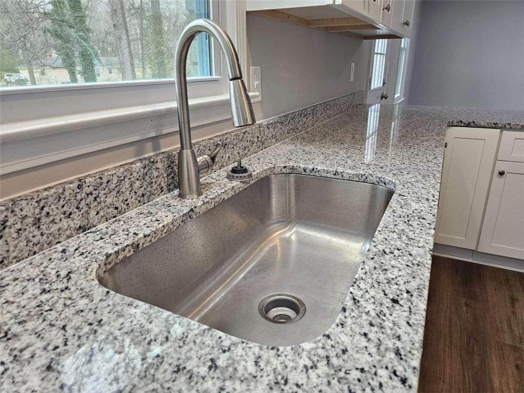 6470 Michell Way Douglasville, GA 30135 - Photo 14 of 41 a close view of a sink a faucet and a shower in a bathroom