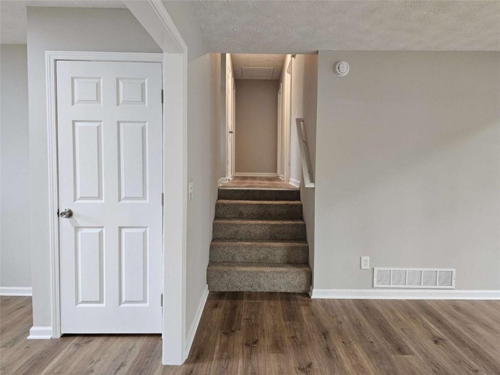 6470 Michell Way Douglasville, GA 30135 - Photo 20 of 41 a view of a hallway with wooden floor and entryway