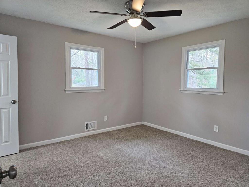 6470 Michell Way Douglasville, GA 30135 - Photo 21 of 41 a view of an empty room with a window