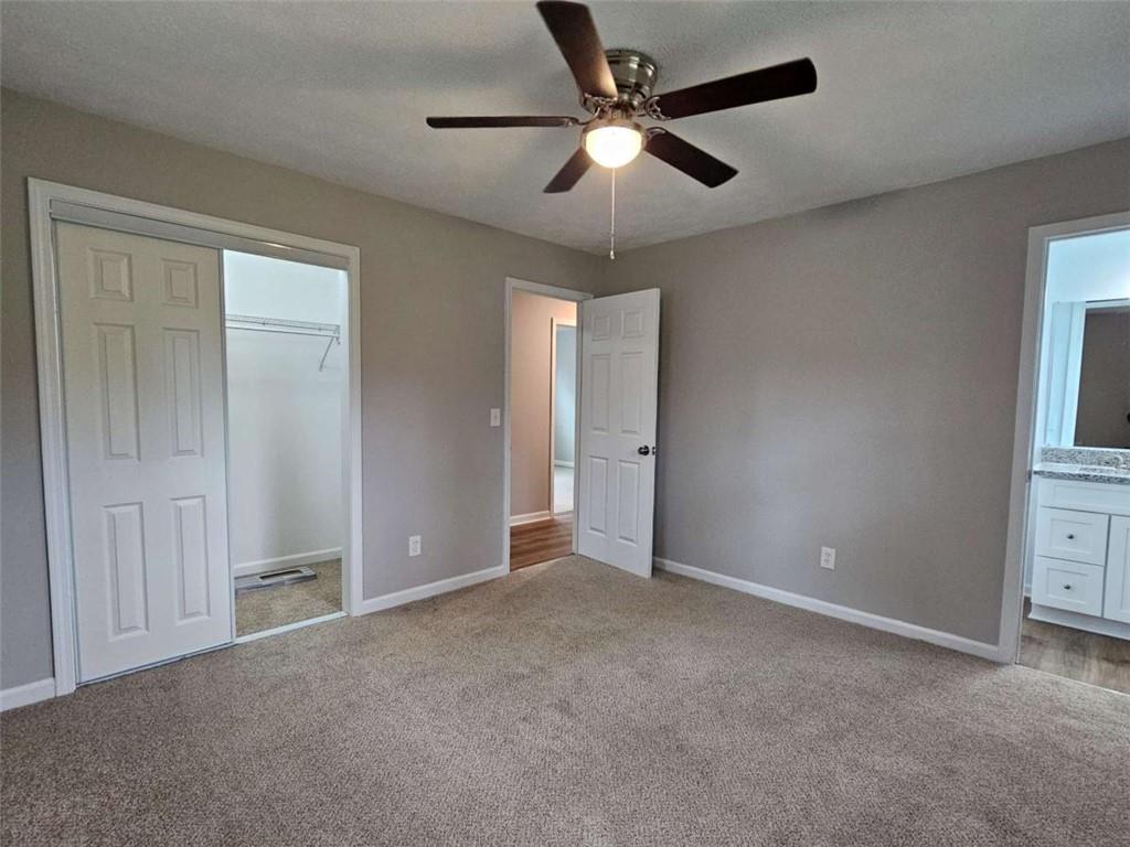 6470 Michell Way Douglasville, GA 30135 - Photo 22 of 41 an empty room with closet and fan
