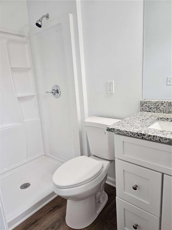 6470 Michell Way Douglasville, GA 30135 - Photo 24 of 41 a bathroom with a sink a toilet and shower