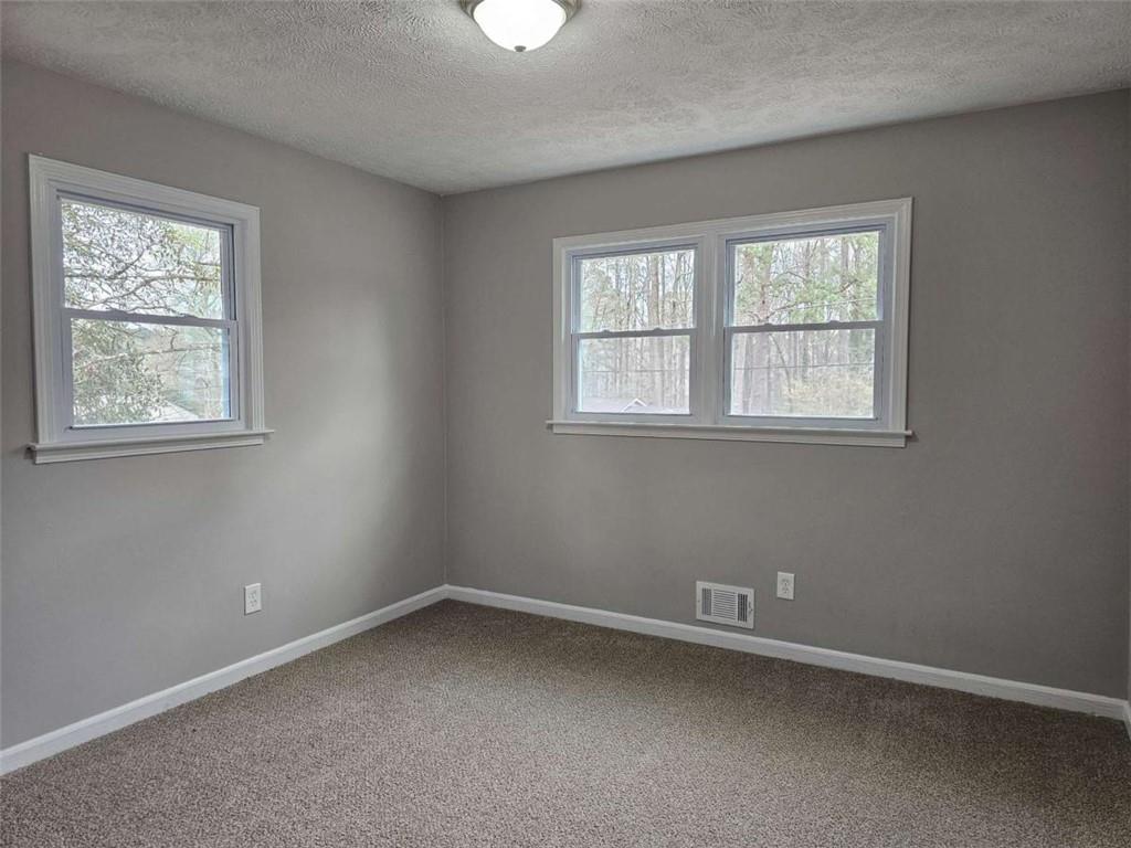 6470 Michell Way Douglasville, GA 30135 - Photo 25 of 41 an empty room with a window