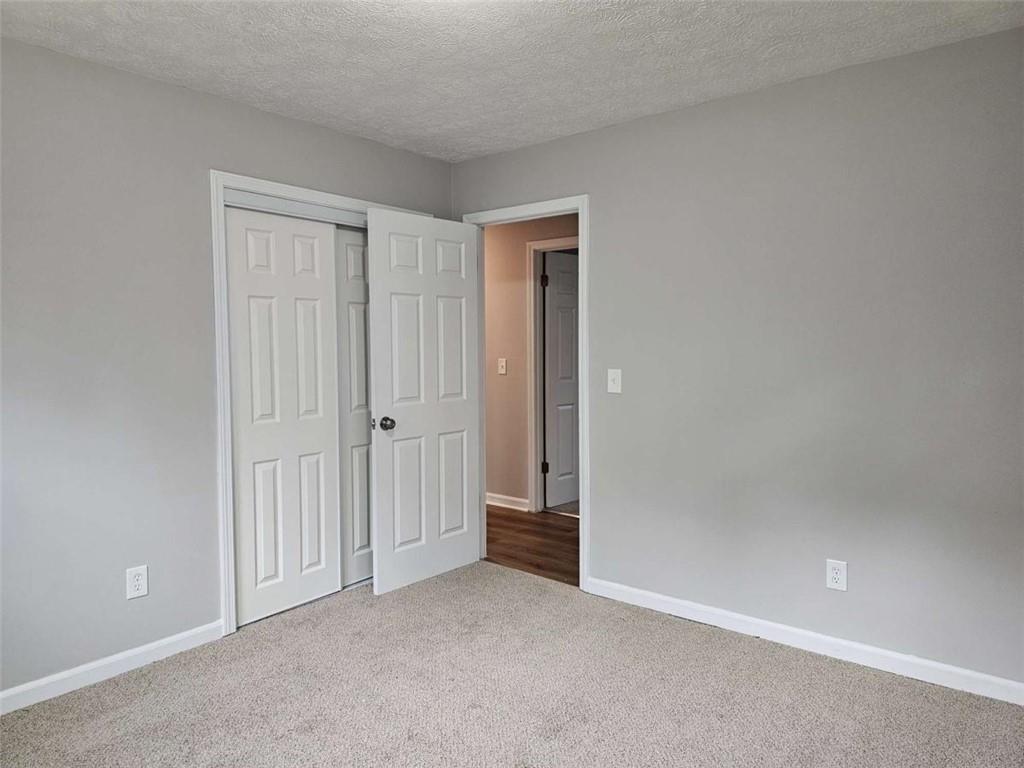 6470 Michell Way Douglasville, GA 30135 - Photo 26 of 41 an empty room with closet area