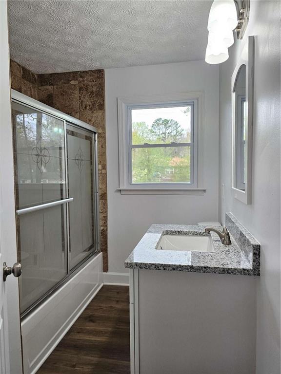 6470 Michell Way Douglasville, GA 30135 - Photo 27 of 41 a bathroom with a granite countertop sink and a mirror