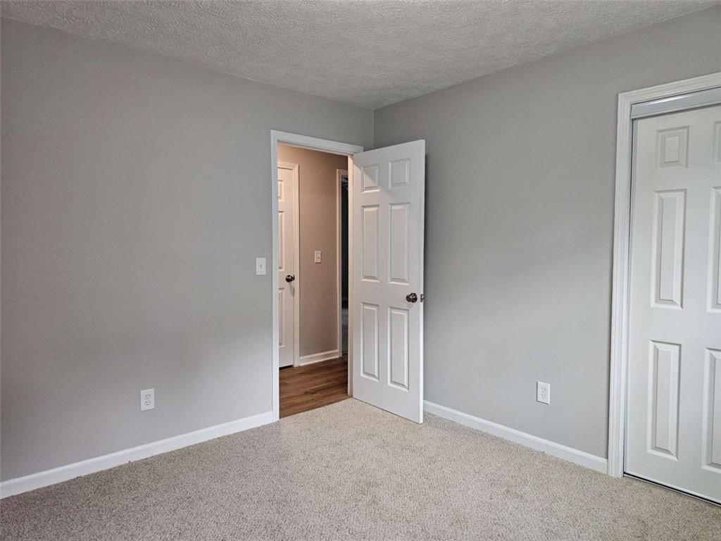 6470 Michell Way Douglasville, GA 30135 - Photo 29 of 41 an empty room with closet area